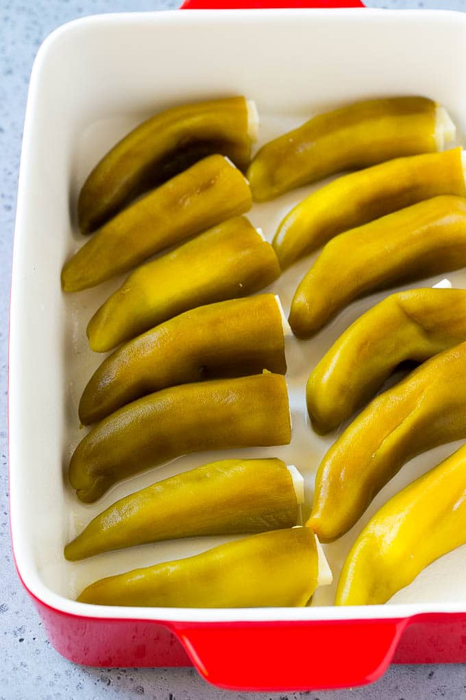 Chile Relleno Casserole Recipe | Baked Chile Rellenos | Mexican Casserole #casserole #chiles #mexican #cheese #dinner #sraye Cheese stuffed chiles in a baking dish.