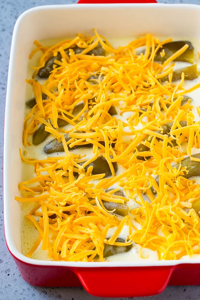 Chile Relleno Casserole Recipe | Baked Chile Rellenos | Mexican Casserole #casserole #chiles #mexican #cheese #dinner #sraye Green chiles in an egg batter topped with shredded cheddar cheese.