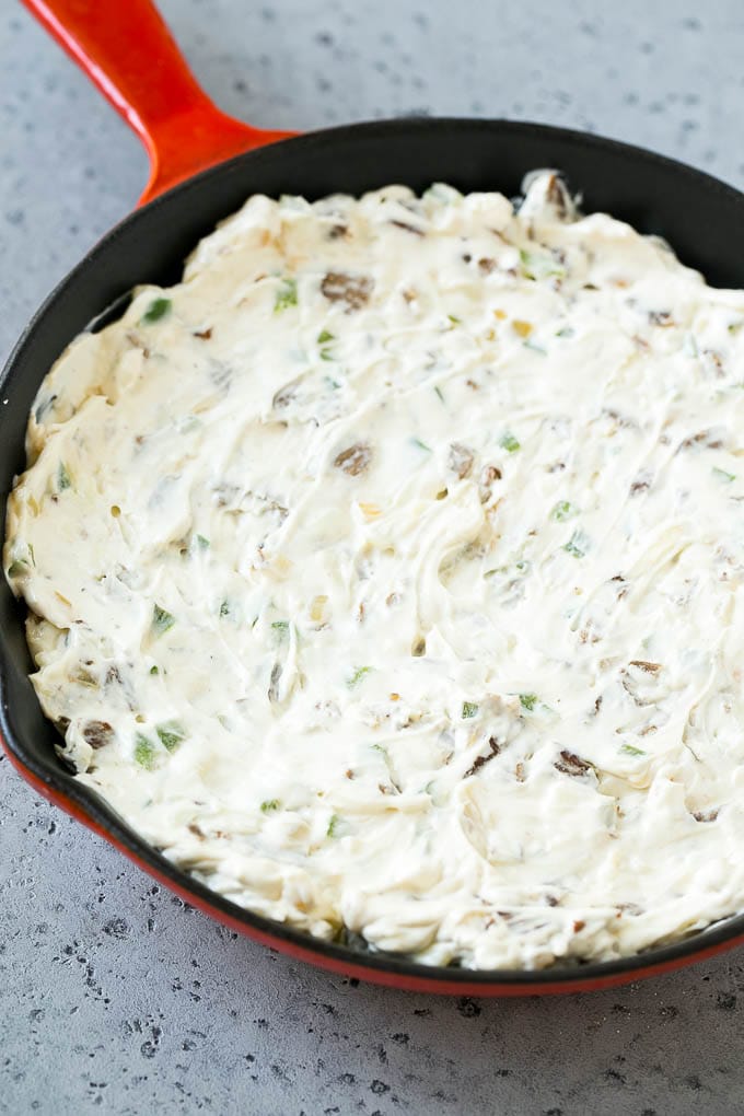 Philly Cheesesteak Dip Recipe | Cheesy Dip | Baked Cheese Dip #steak #dip #appetizer #cheese #sraye Steak, peppers and onions in a skillet, mixed with cream cheese.