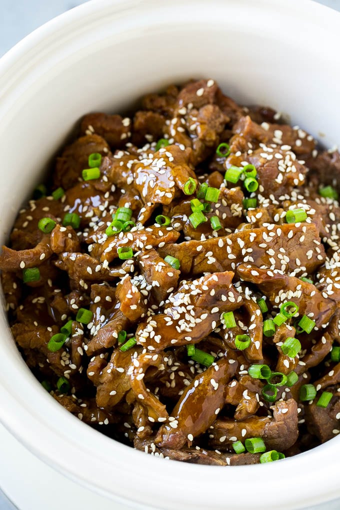 Slow Cooker Korean Beef Recipe | Korean Beef | Flank Steak Recipe #dinner #beef #slowcooker #crockpot #asian #sraye Slow cooker Korean beef with flank steak slices in a sweet and savory sauce, all inside a crock pot.