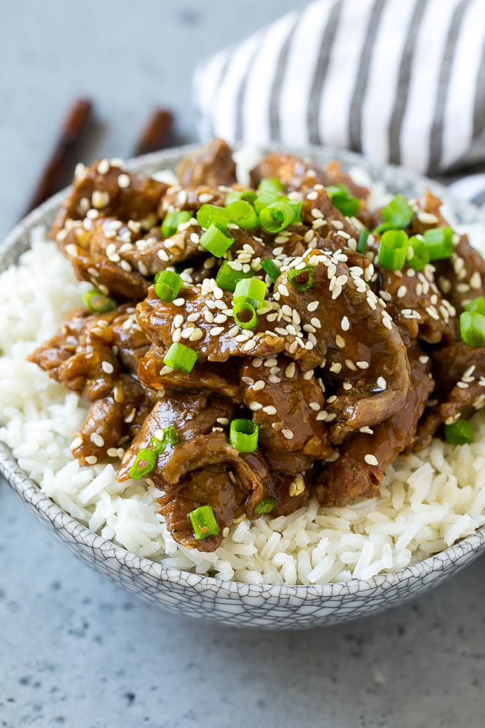 Slow Cooker Korean Beef Recipe | Korean Beef | Flank Steak Recipe #dinner #beef #slowcooker #crockpot #asian #sraye Slow cooker Korean beef served over steamed rice.