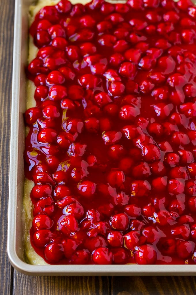 Cherry Bars Recipe | Cherry Pie Bars | Cherry Cookies | Bar Cookies #cookies #bars #cherry #baking #dessert #sweets #sraye Filling spread over a cookie crust.