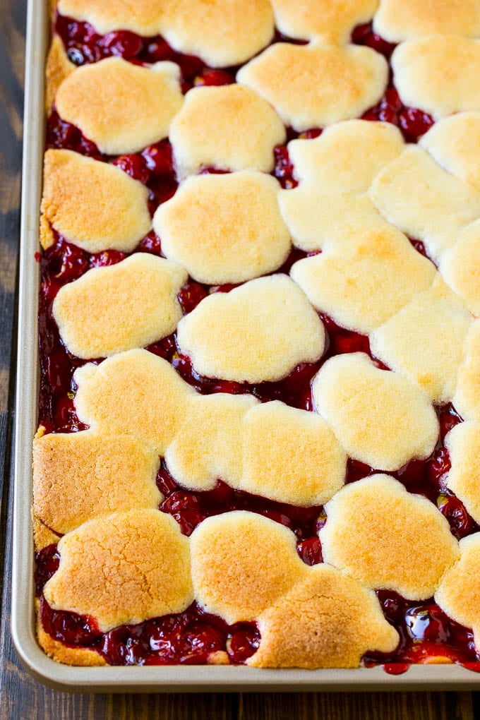 Cherry Bars Recipe | Cherry Pie Bars | Cherry Cookies | Bar Cookies #cookies #bars #cherry #baking #dessert #sweets #sraye A pan of baked dough and filling.