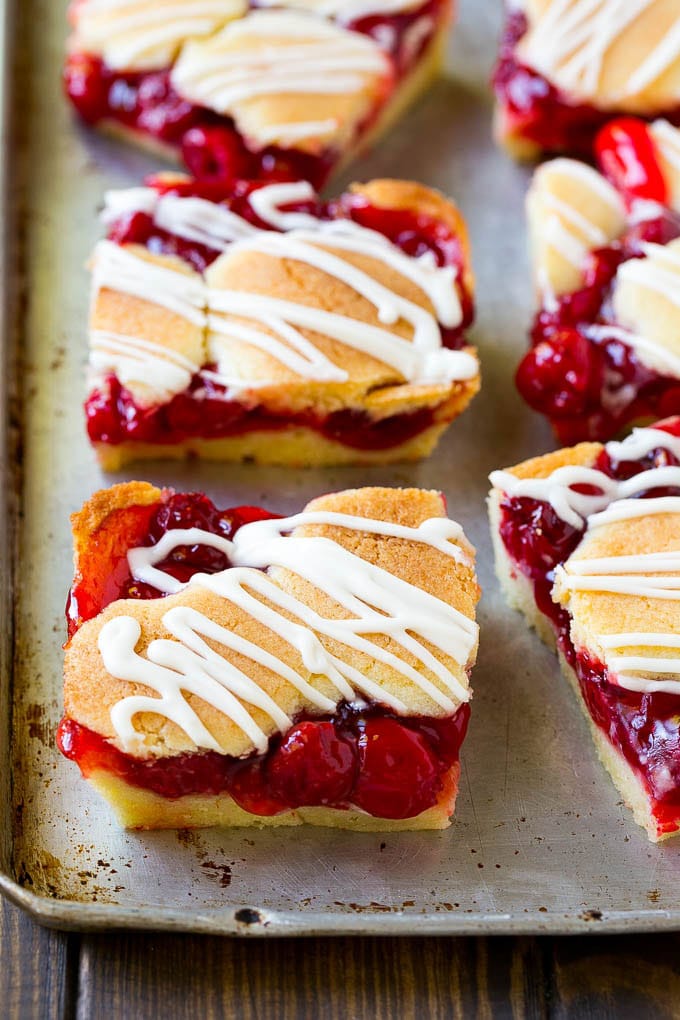Cherry Bars Recipe | Cherry Pie Bars | Cherry Cookies | Bar Cookies #cookies #bars #cherry #baking #dessert #sweets #sraye Cherry bars made with almond cookie dough on a sheet pan.
