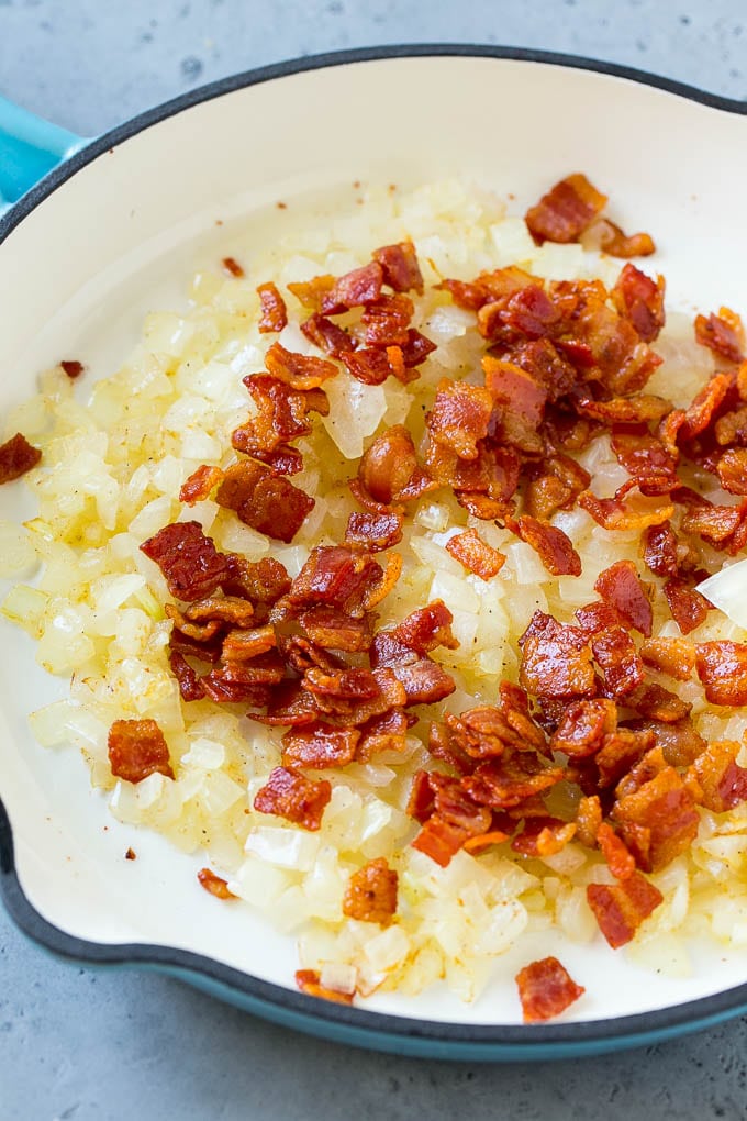 Fried Cabbage Recipe | Cabbage with Bacon | Cabbage Side Dish #cabbage #bacon #sidedish #lowcarb #keto #sraye Sauteed bacon and onions in a skillet.