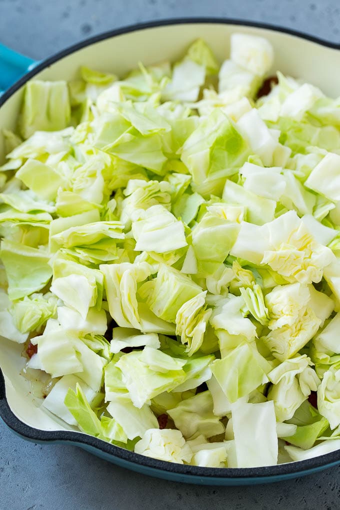 Fried Cabbage Recipe | Cabbage with Bacon | Cabbage Side Dish #cabbage #bacon #sidedish #lowcarb #keto #sraye Bacon, onions and cabbage in a skillet.