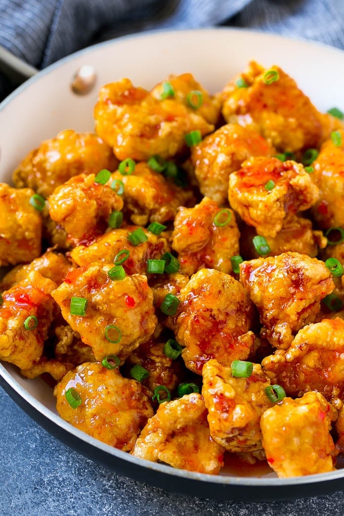 Sweet Chili Chicken Recipe | Thai Chicken | Asian Chicken #chicken #thaifood #chili #dinner #sraye Sweet chili chicken in a skillet, topped with sliced green onions.