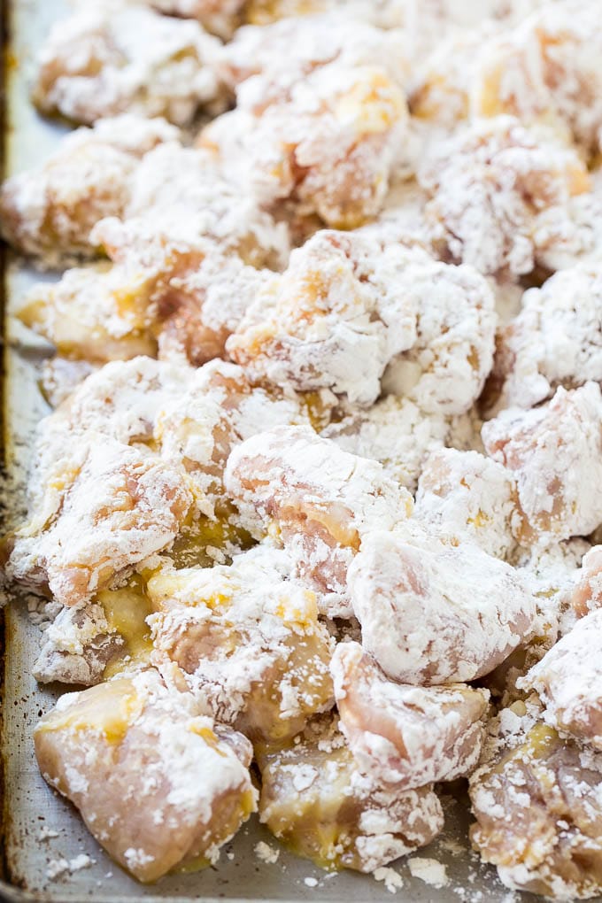 Sweet Chili Chicken Recipe | Thai Chicken | Asian Chicken #chicken #thaifood #chili #dinner #sraye Chicken pieces coated in egg and flour.