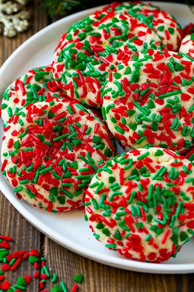 Cake Mix Cookies Recipe | Sprinkle Cookies | Christmas Cookies #cookies #christmas #sprinkles #dessert #baking #sraye Cake mix cookies with sprinkles on a serving plate.