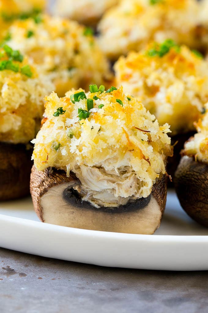 Crab Stuffed Mushrooms Recipe | Stuffed Mushrooms | Mushroom Appetizer #crab #seafood #mushrooms #lowcarb #appetizer #sraye A cross section of a crab stuffed mushroom.