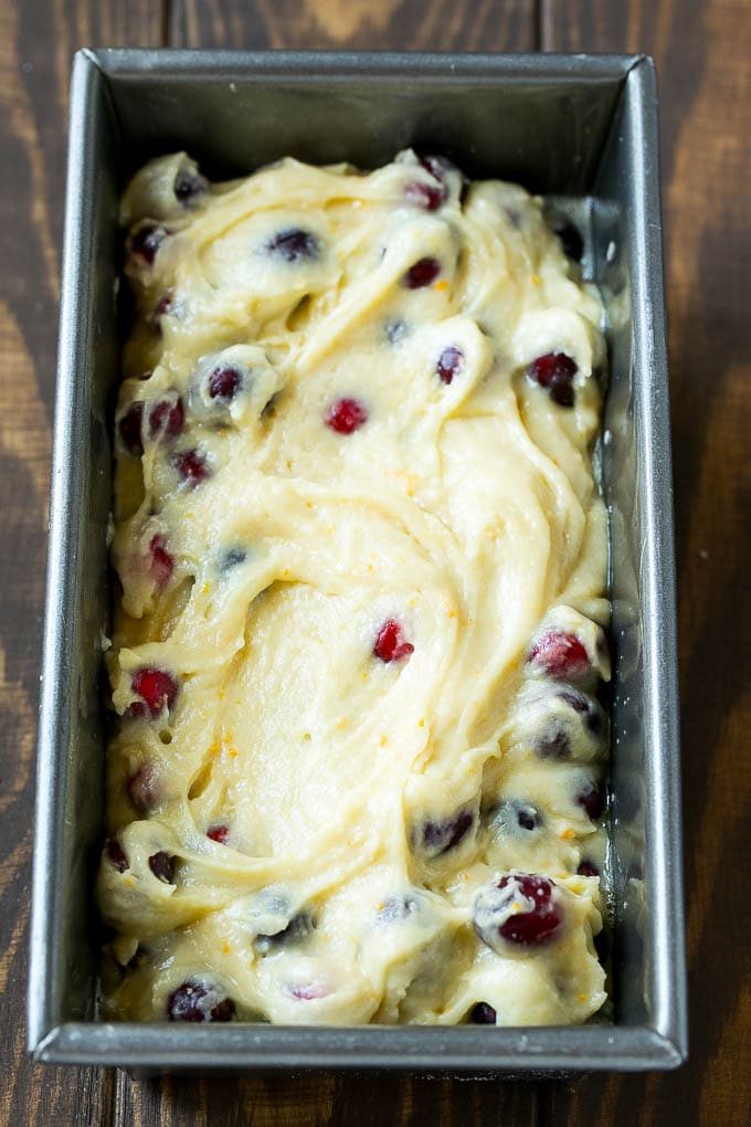 Cranberry Bread Recipe | Cranberry Loaf | Cranberry Orange Bread #cranberry #bread #baking #dessert #fall #sraye Ccranberry bread batter spread into a loaf pan.