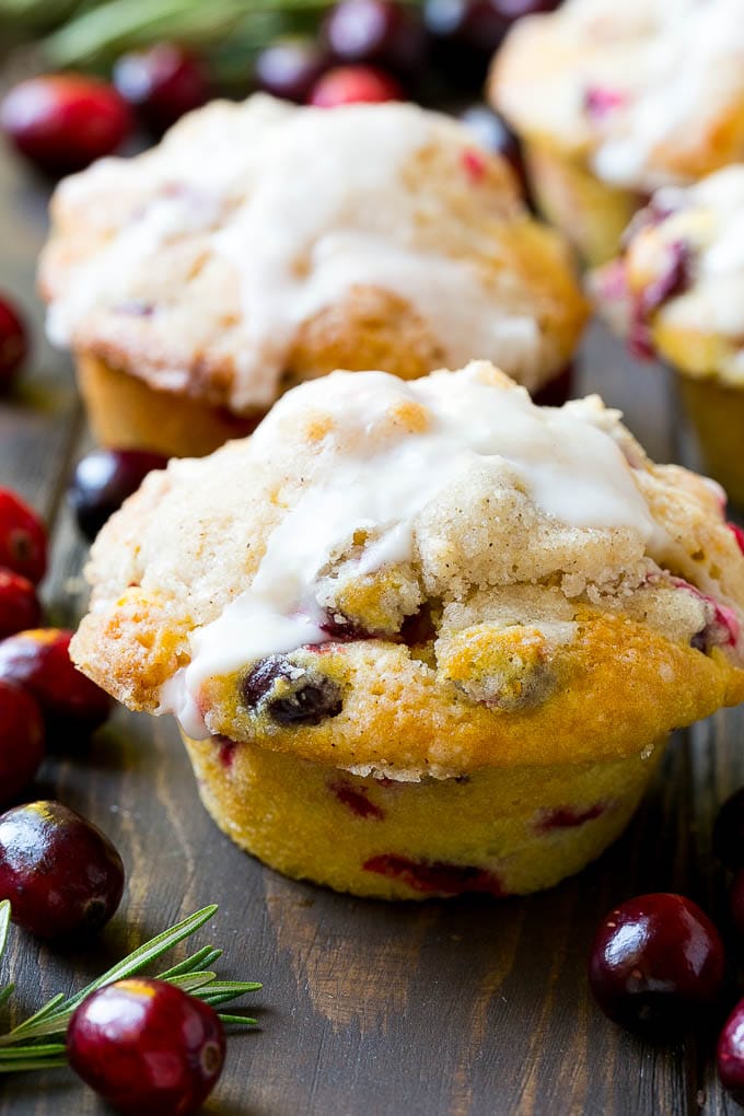 Cranberry Muffins Recipe | Cranberry Orange Muffins #cranberry #muffins #orange #fall #dessert #sraye Cranberry muffins topped with streusel and orange glaze.