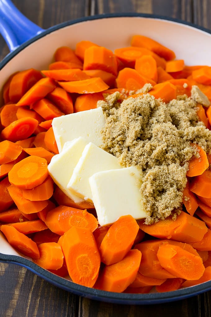 Glazed Carrots Recipe | Brown Sugar Carrots | Carrot Side Dish #carrots #brownsugar #sidedish #glutenfree #thanksgiving #fall #dinner #sraye Sliced cooked carrots with butter and brown sugar.