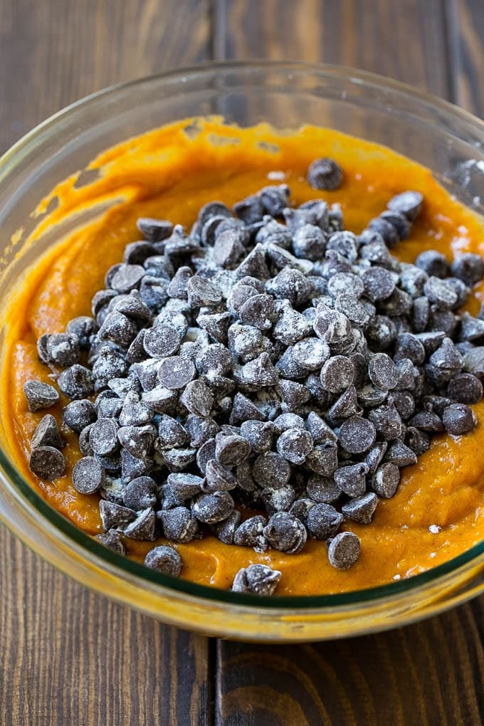 Pumpkin Chocolate Chip Bread Recipe | Pumpkin Bread | Chocolate Pumpkin Bread #pumpkin #bread #fall #chocolate #baking #dessert #sraye Pumpkin bread batter with chocolate chips in it.