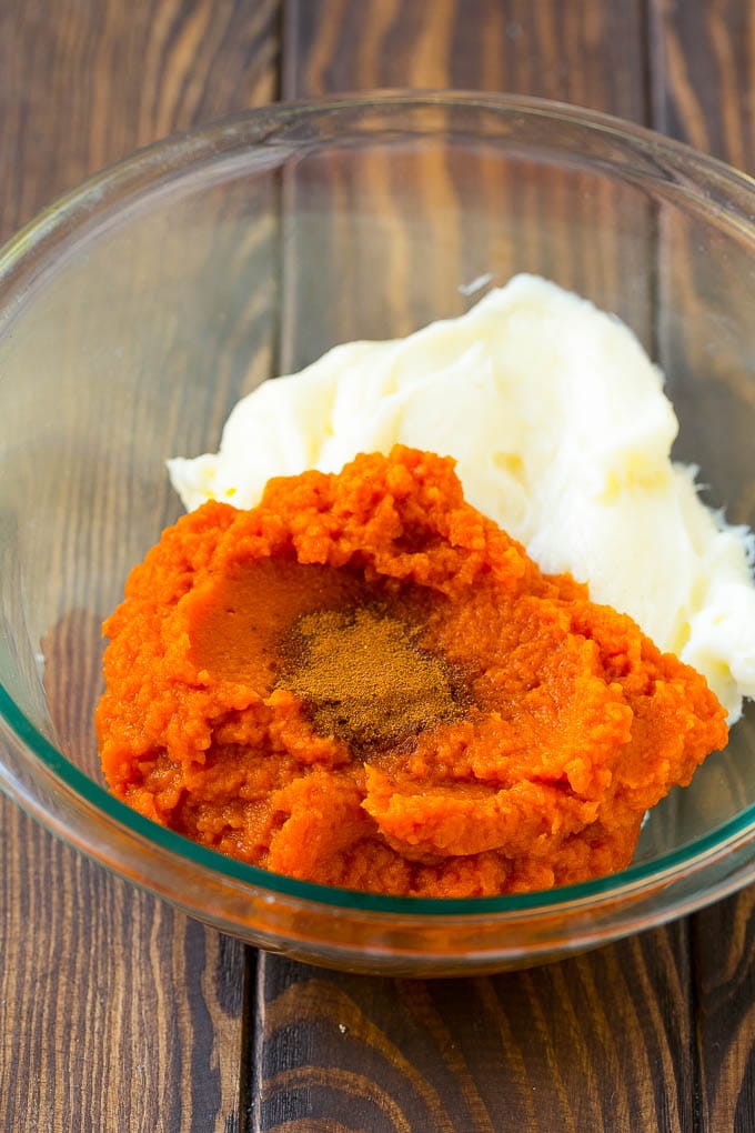 Pumpkin Dip Recipe | Dessert Dip | Pumpkin Pie Dip #pumpkin #dessert #dip #fall #thanksgiving #sraye Puree, cream cheese and spices in a bowl.