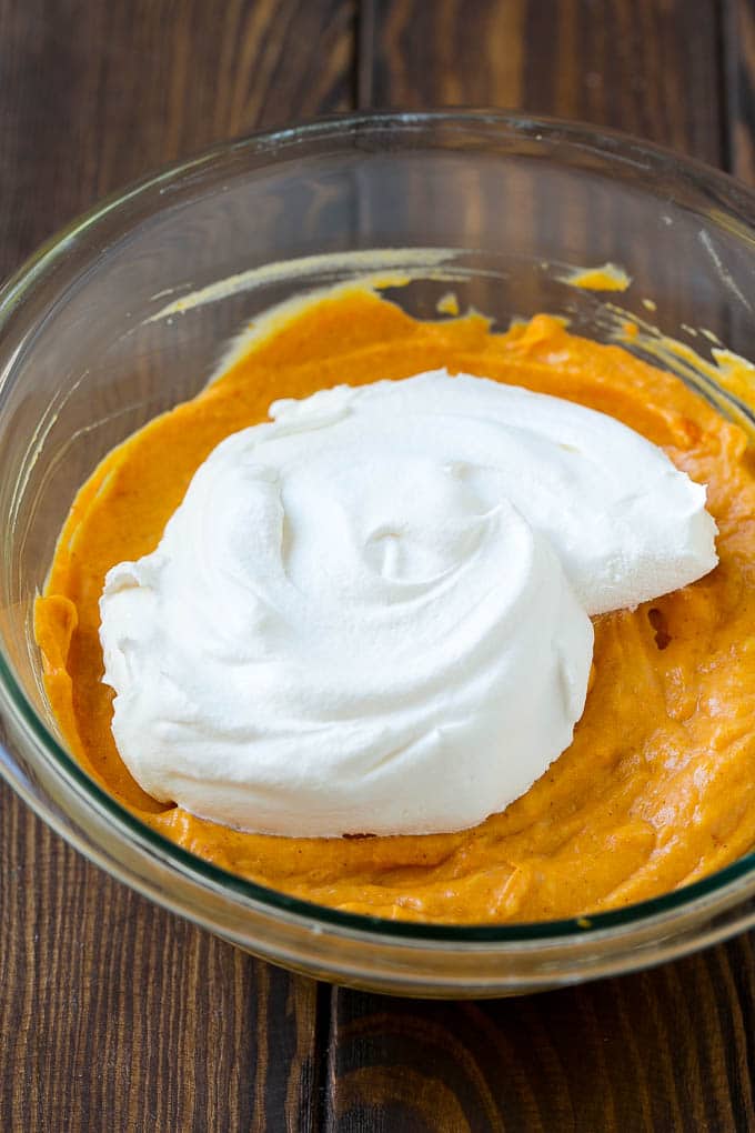 Pumpkin Dip Recipe | Dessert Dip | Pumpkin Pie Dip #pumpkin #dessert #dip #fall #thanksgiving #sraye Cool whip in a bowl with the creamy base.