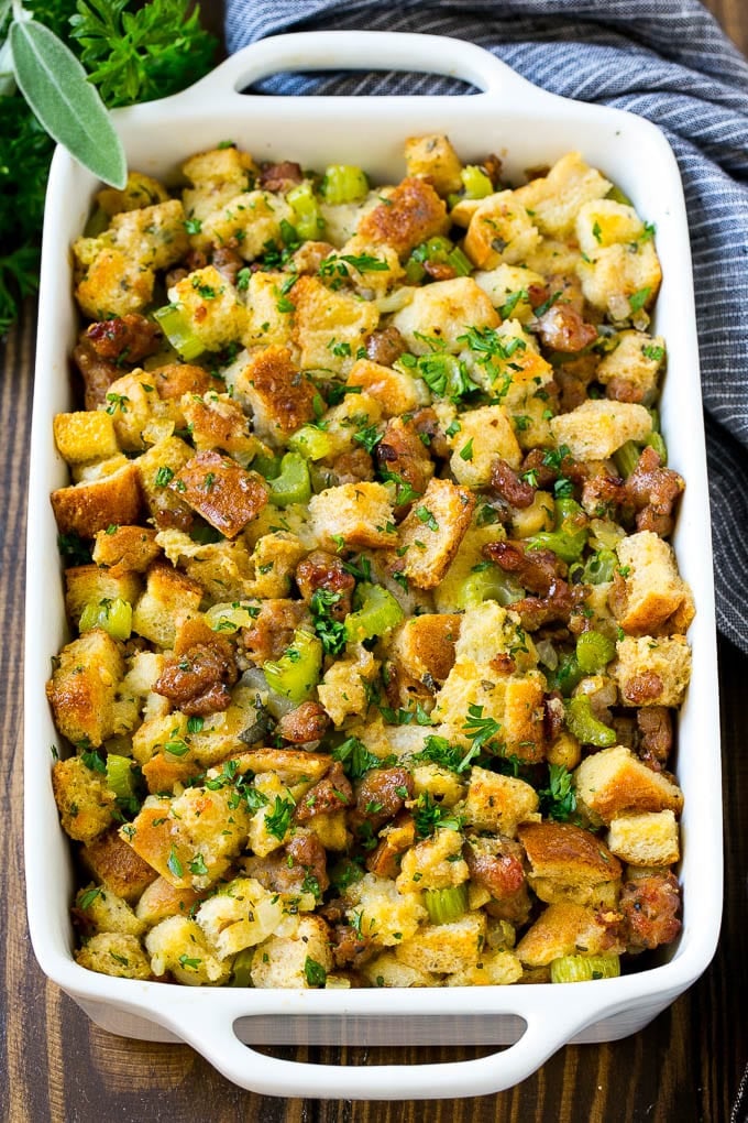 Sausage Stuffing Recipe | Thanksgiving Stuffing | Make Ahead Stuffing #stuffing #thanksgiving #sausage #sidedish #dinner #sraye A baking dish of sausage stuffing made with Italian sausage, bread cubes and vegetables.