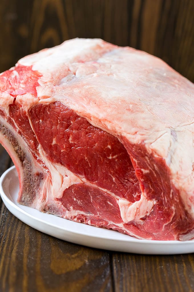Smoked Prime Rib Recipe | Easy Prime Rib | Smoked Beef | Holiday Prime Rib #primerib #beef #smoker #dinner #sraye #christmas #thanksgiving #lowcarb #keto An uncooked standing rib roast.