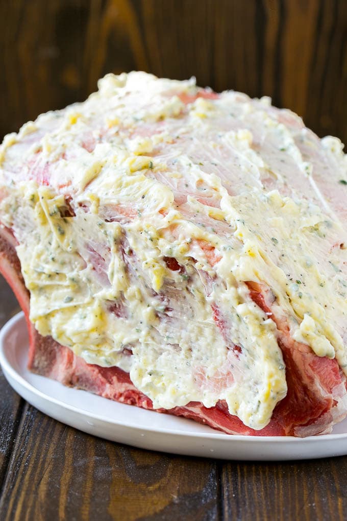 Smoked Prime Rib Recipe | Easy Prime Rib | Smoked Beef | Holiday Prime Rib #primerib #beef #smoker #dinner #sraye #christmas #thanksgiving #lowcarb #keto A roast coated in garlic and herb butter.