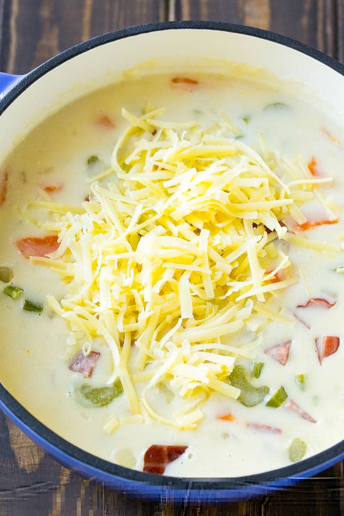 Ham and Potato Soup | Ham Soup | Potato Soup #soup #ham #potato #dinner #comfortfood #sraye Shredded white cheddar cheese to be stirred into ham and potato soup.