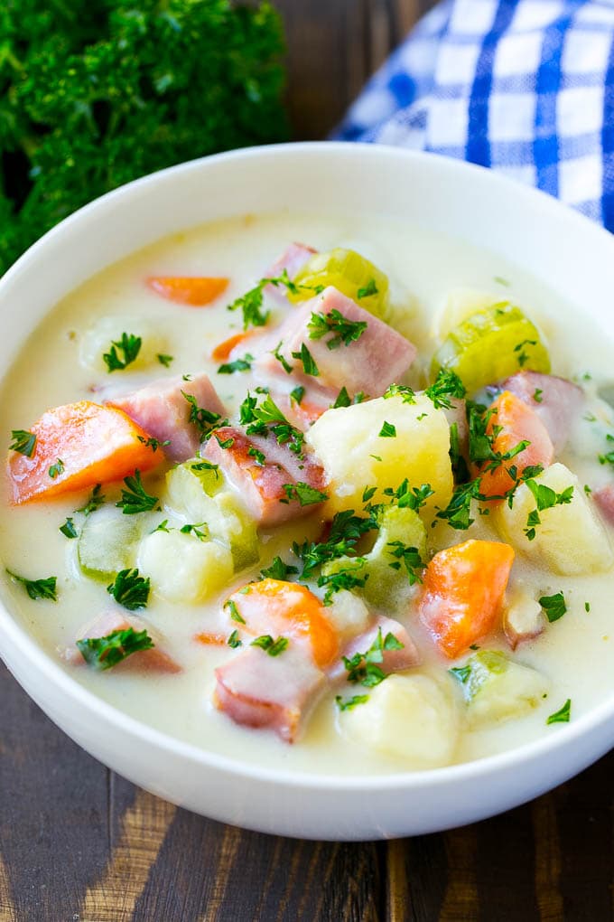 Ham and Potato Soup | Ham Soup | Potato Soup #soup #ham #potato #dinner #comfortfood #sraye A bowl of ham and potato soup loaded with veggies in a creamy broth.