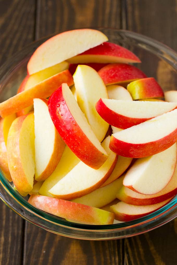 Fried Apples Recipe | Sauteed Apples | Cinnamon Sugar Apples #apples #cinnamon #sugar #sidedish #dessert #sraye #fall Sliced apples in a mixing bowl.