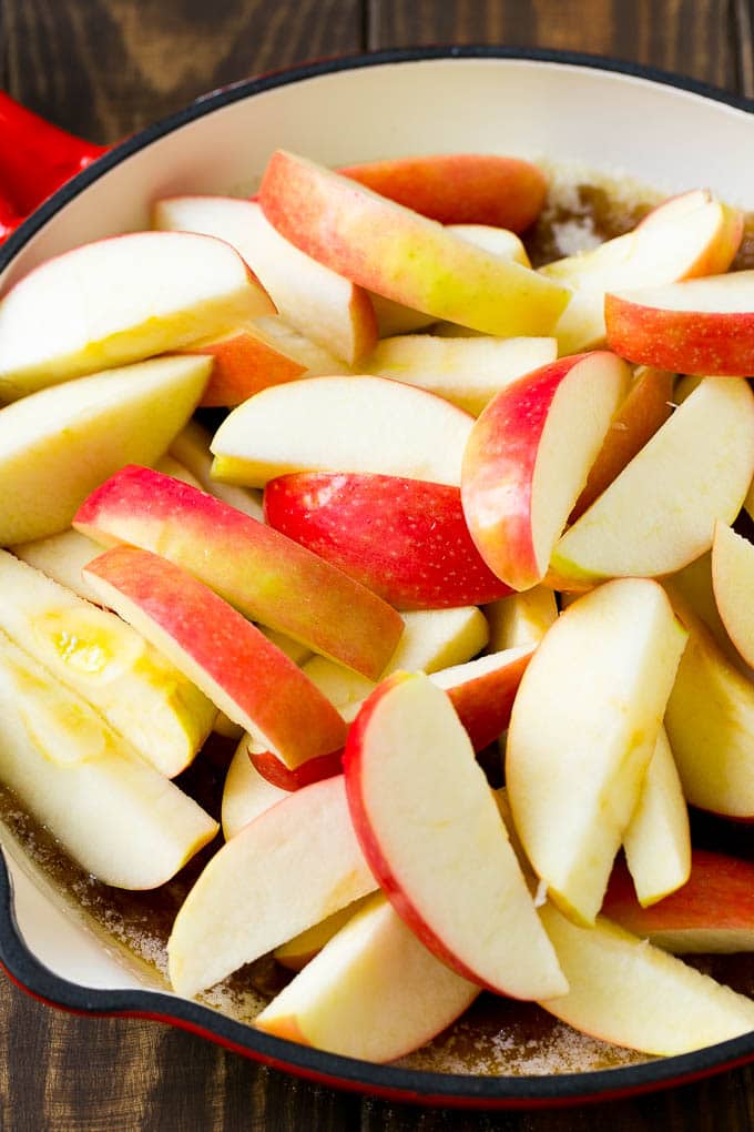 Fried Apples Recipe | Sauteed Apples | Cinnamon Sugar Apples #apples #cinnamon #sugar #sidedish #dessert #sraye #fall Sliced apples in a pan with butter, sugar and cinnamon.