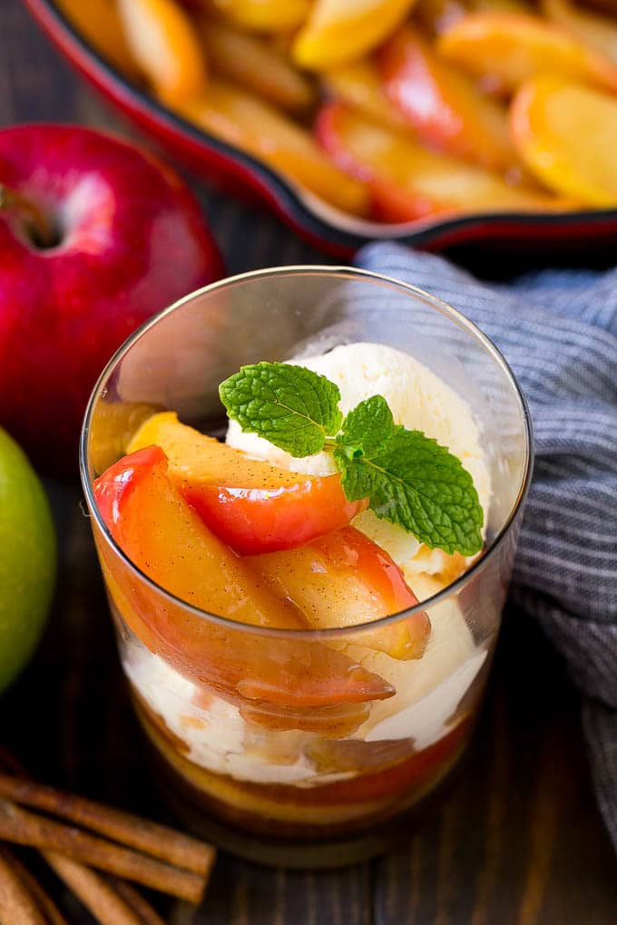 Fried Apples Recipe | Sauteed Apples | Cinnamon Sugar Apples #apples #cinnamon #sugar #sidedish #dessert #sraye #fall A cup of fried apples served with vanilla ice cream and garnished with fresh mint.