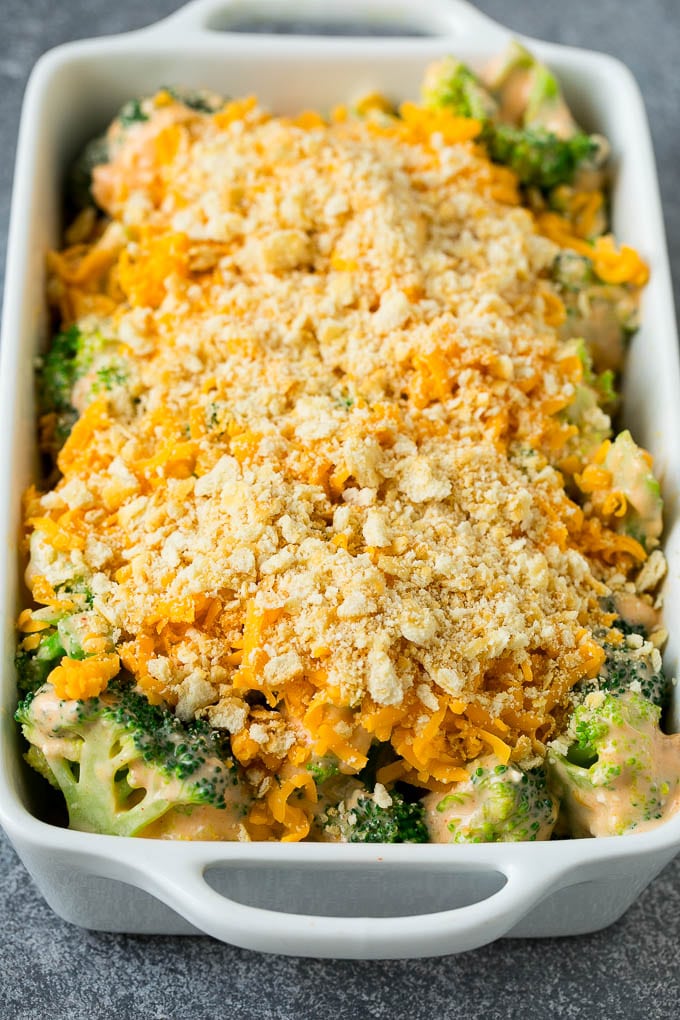 Broccoli Casserole Recipe | Broccoli and Cheese Casserole | Baked Broccoli #broccoli #cheese #casserole #sidedish #dinner #sraye Broccoli in cheese sauce topped with crushed crackers and shredded cheese.