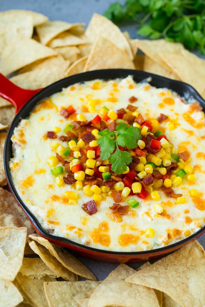 Corn Dip Recipe | Hot Cheese Dip | Bacon Dip #corn #dip #bacon #cheese #appetizer #snack #sraye Hot corn dip made with two types of cheese, corn, peppers and bacon, served with tortilla chips.