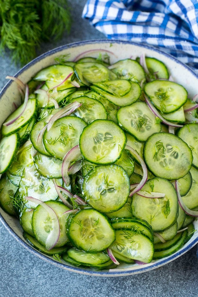 Cucumber Salad Recipe | Cucumber Dill Salad | Cucumber Recipe #cucumbers #salad #glutenfree #sidedish #sraye Cucumber salad in a serving bowl with sliced English cucumbers, red onion and fresh dill.