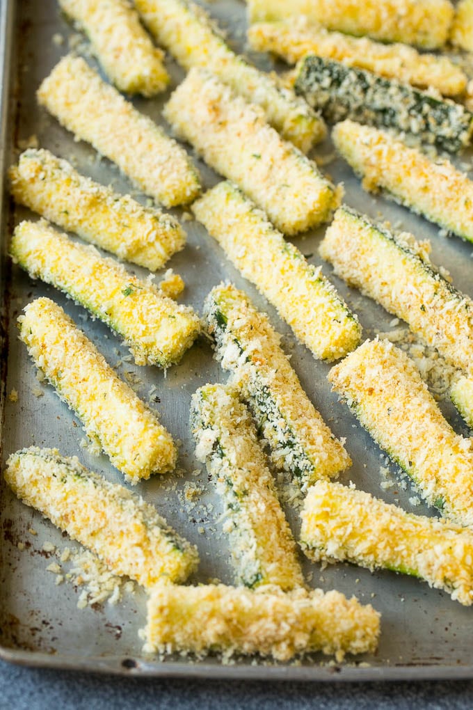 Fried Zucchini Recipe | Zucchini Fries | Zucchini Recipe #appetizer #zucchini #snack #sraye Sticks coated in egg, parmesan and breadcrumbs.