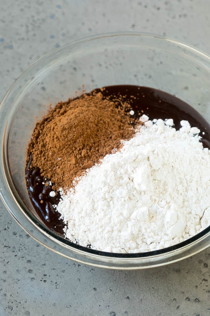 Oreo Brownies Recipe | Homemade Brownies | Chocolate Chip Brownies #brownies #oreos #chocolate #dessert #sweets #sraye Melted chocolate, sugar, cocoa powder and flour in a mixing bowl.