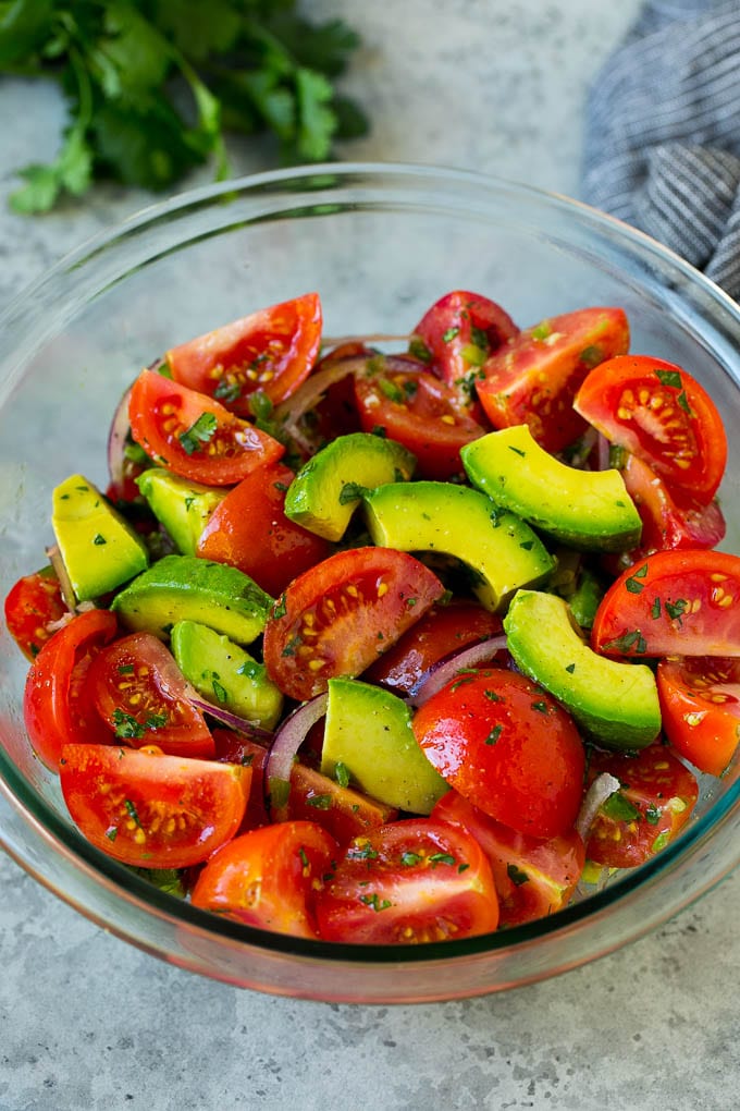 Tomato Avocado Salad Recipe | Avocado Salad | Tomato Salad #salad #tomato #avocado #glutenfree #cleaneating #dinner #sraye #healthy Tomato avocado salad with red onion and a cilantro lime dressing.