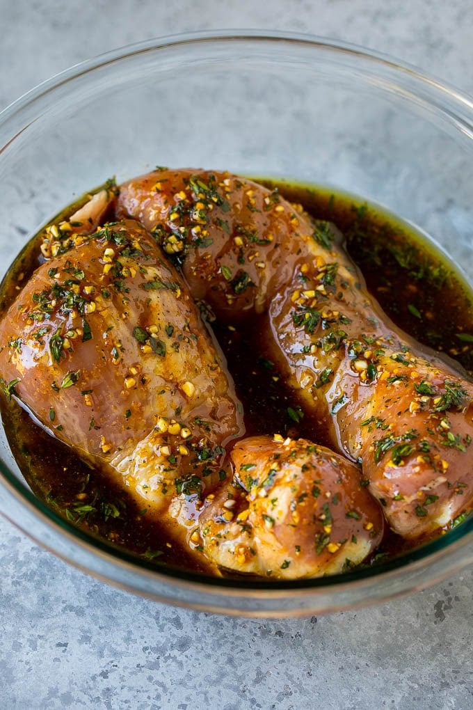 Marinated Pork Tenderloin Recipe | Pork Tenderloin Marinade | Pork Marinade #pork #porktenderloin #marinade #dinner #grilling #sraye Pork tenderloins in a bowl of marinade.