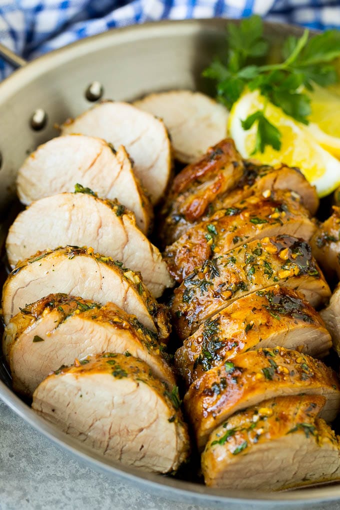 Marinated Pork Tenderloin Recipe | Pork Tenderloin Marinade | Pork Marinade #pork #porktenderloin #marinade #dinner #grilling #sraye Pork tenderloin marinade with sliced cooked pork in a skillet.