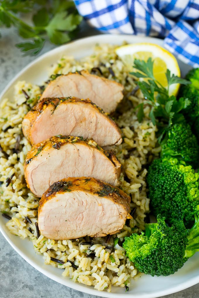 Marinated Pork Tenderloin Recipe | Pork Tenderloin Marinade | Pork Marinade #pork #porktenderloin #marinade #dinner #grilling #sraye Pork tenderloin marinade over sliced pork, served with rice and broccoli.