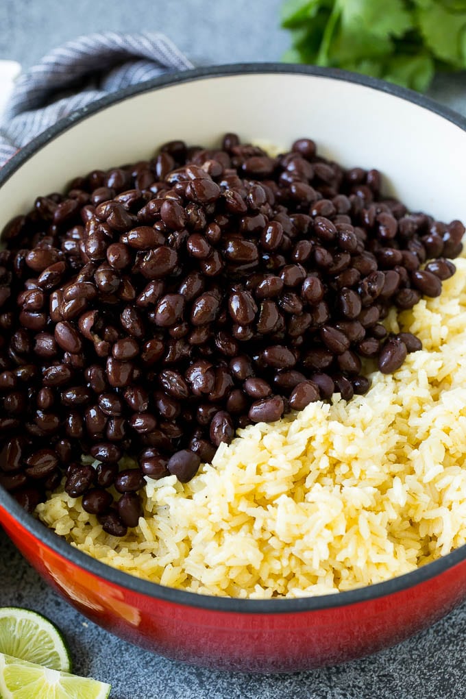 Black Beans and Rice Recipe | Cuban Black Beans | Beans and Rice #beans #rice #blackbeans #sidedish #glutenfree #dinner #sraye Cooked rice and black beans in a pot.
