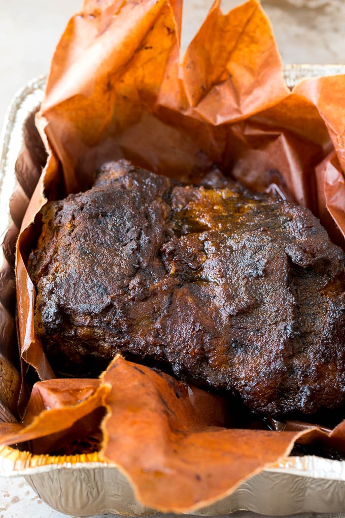 Burnt Ends Recipe | Smoked Brisket | Beef Brisket #brisket #bbq #smoker #beef #dinner #sraye Smoked brisket in a metal pan.