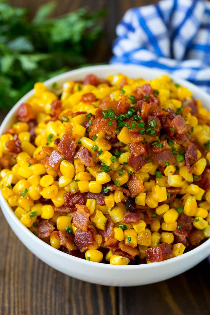 Bacon Fried Corn Recipe | Sauteed Corn | Corn Side Dish #corn #bacon #sidedish #glutenfree #dinner #sraye A serving bowl of Southern fried corn with bacon.