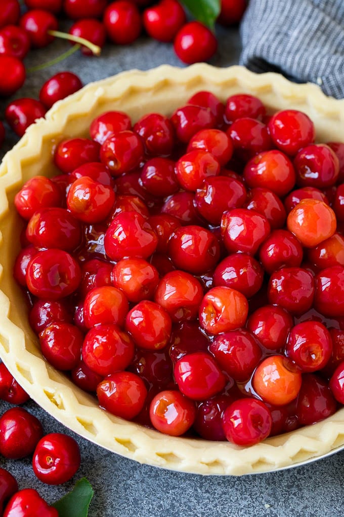 Cherry Pie Filling Recipe #pie #cherries #dessert #sweets #sraye #summer Cherry pie filling inside of an unbaked pie crust.