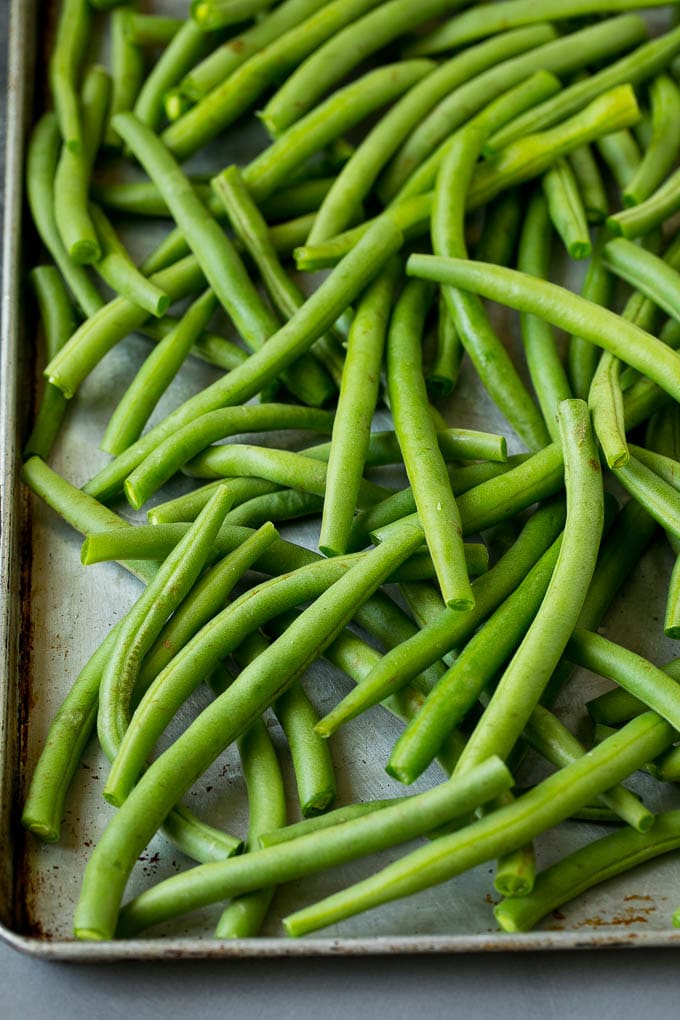 Fried Green Beans Recipe | Green Beans #greenbeans #appetizer #snack #sraye Green beans on a sheet pan.