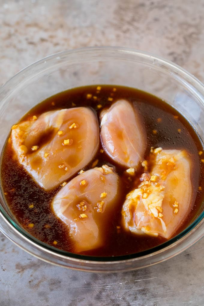 Huli Huli Chicken Recipe | Hawaiian Chicken | Grilled Chicken Thighs #chicken #pineapple #grilling #dinner #sraye Chicken thighs in a bowl of marinade.