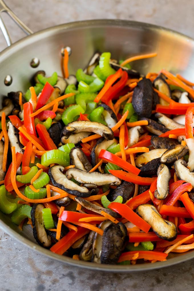 Stir Fry Noodles Recipe | Noodle Stir Fry #chicken #noodles #stirfry #mushrooms #dinner #sraye Mushrooms, bell pepper, celery and carrot in a pan.