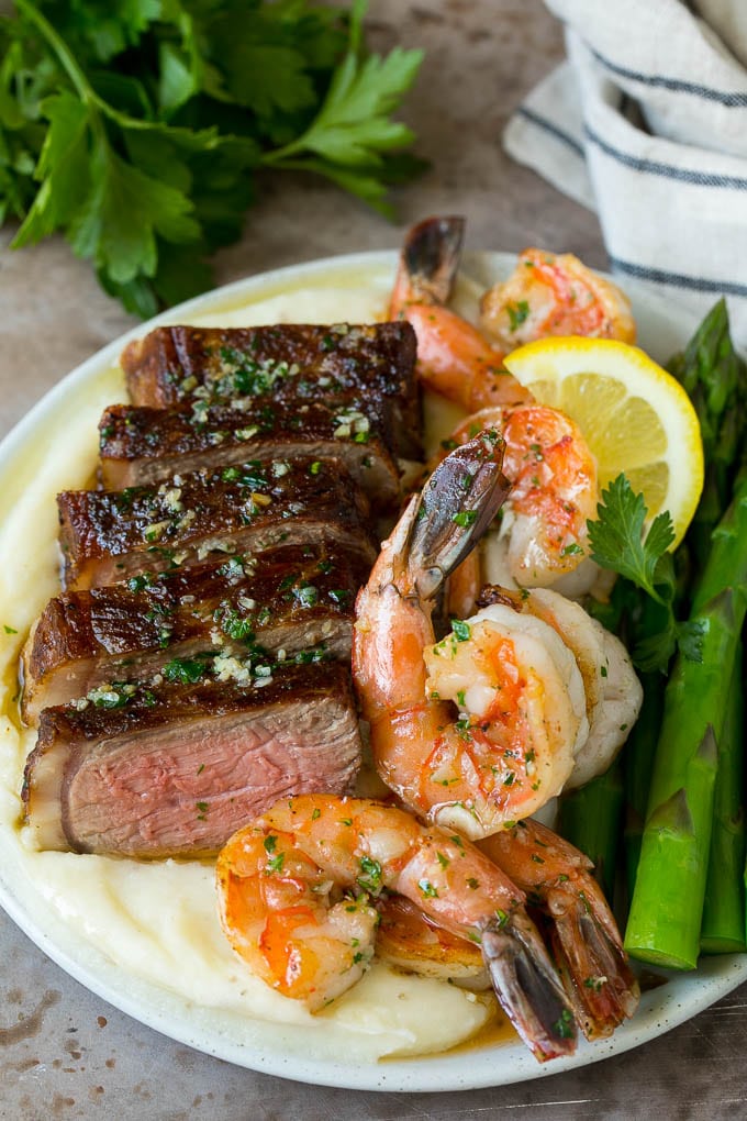 Surf and Turf Recipe | Seared Steak #steak #shrimp #keto #lowcarb #dinner #sraye Surf and turf with steak, shrimp, mashed potatoes and asparagus.