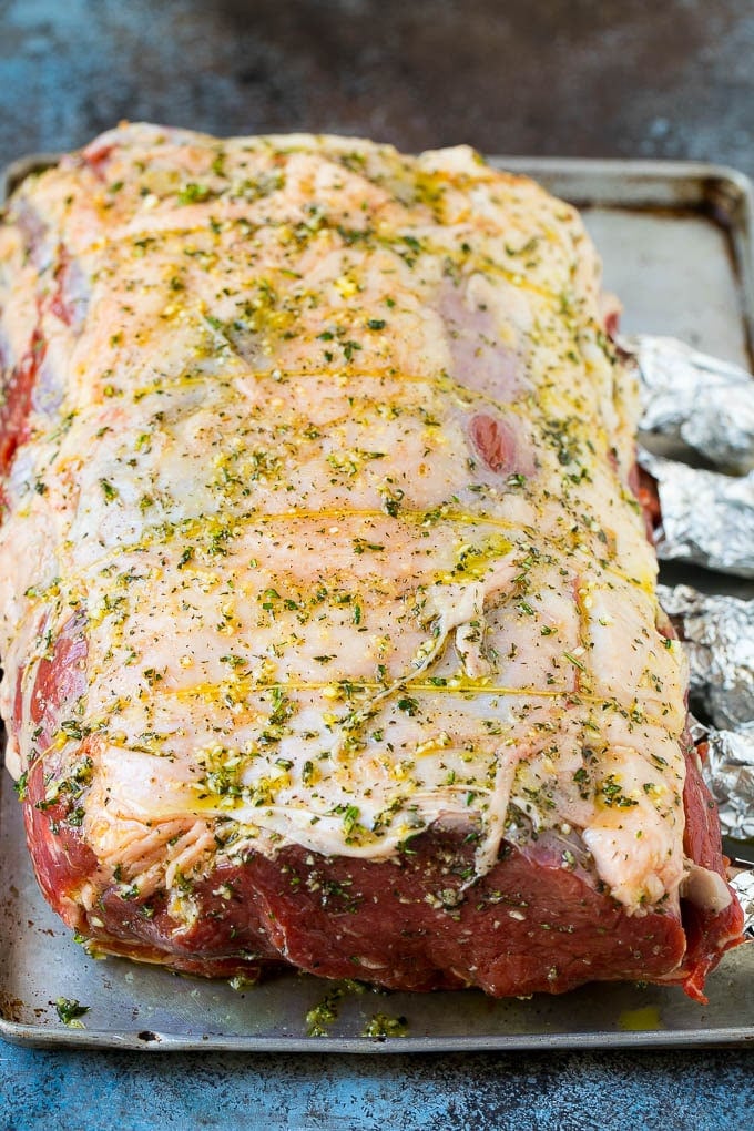 Prime Rib Recipe #primerib #beef #roast #dinner #thanksgiving #christmas #keto #lowcarb #sraye Prime rib coated in garlic, herbs and olive oil.