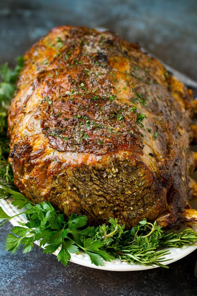 Prime Rib Recipe #primerib #beef #roast #dinner #thanksgiving #christmas #keto #lowcarb #sraye A slow roasted prime rib on a serving platter.