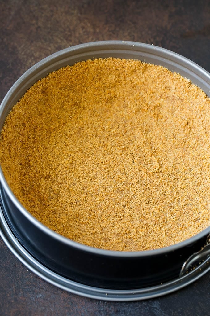 Pumpkin Pie Cheesecake Recipe | Pumpkin Cheesecake #cake #cheesecake #pumpkin #fall #thanksgiving #dessert #sraye Graham cracker crust in a springform pan.