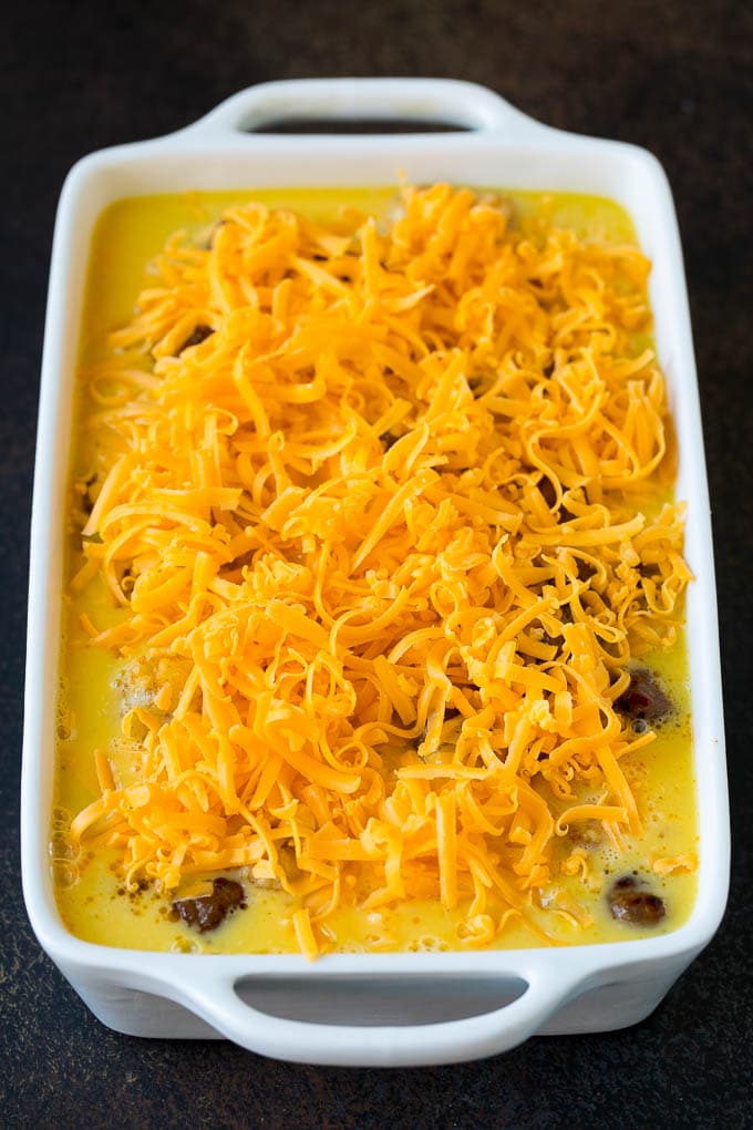 Sausage Egg Casserole Recipe | Egg Casserole #eggs #sausage #potato #cheese #casserole #breakfast #brunch #sraye An unbaked egg casserole ready to go into the oven.
