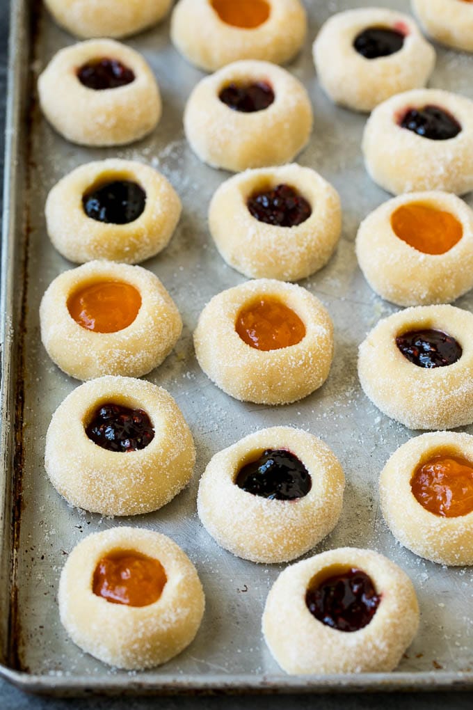 Thumbprint Cookies | Sugar Cookies #cookies #baking #christmas #dessert #sraye Cookie dough filled with fruit jam.